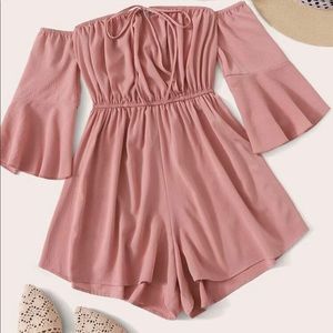 Pink romper size 6 (medium)